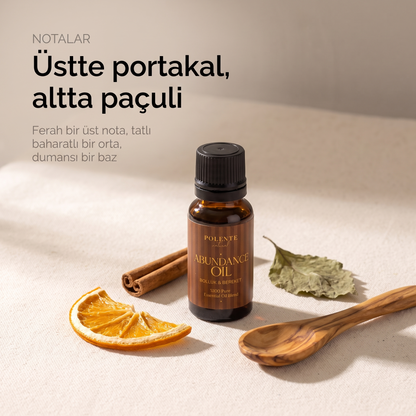 Bolluk &amp; Bereket Karışımı nota yapısı — üstte portakal, ortada tarçın, bazda paçuli