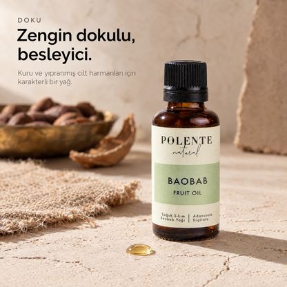 Baobab Yağı 30 ml — yağın dokusu, yüzeydeki tek damlanın makro çekimi