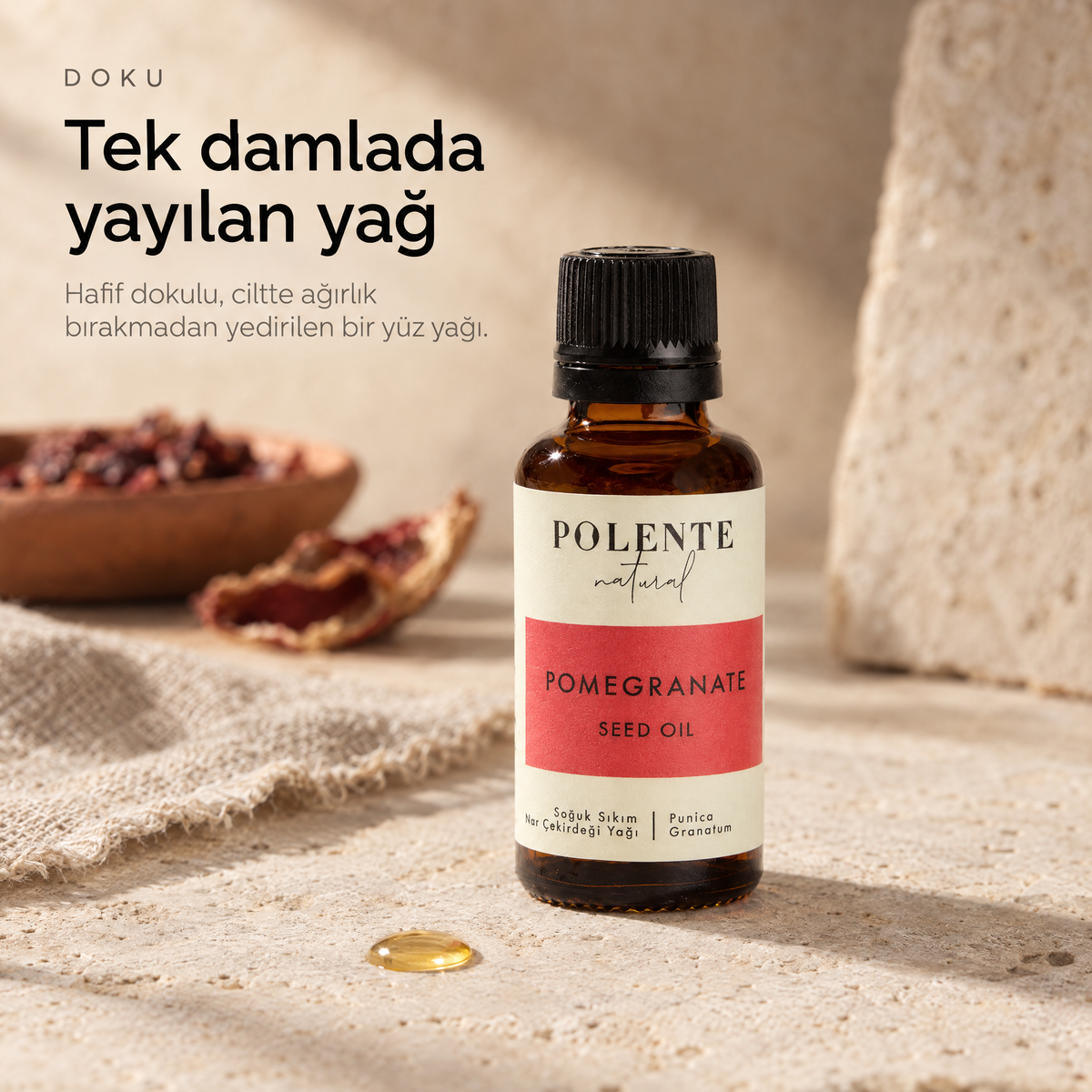 Nar Çekirdeği Yağı 30 ml — yağın dokusu, yüzeydeki tek damlanın makro çekimi