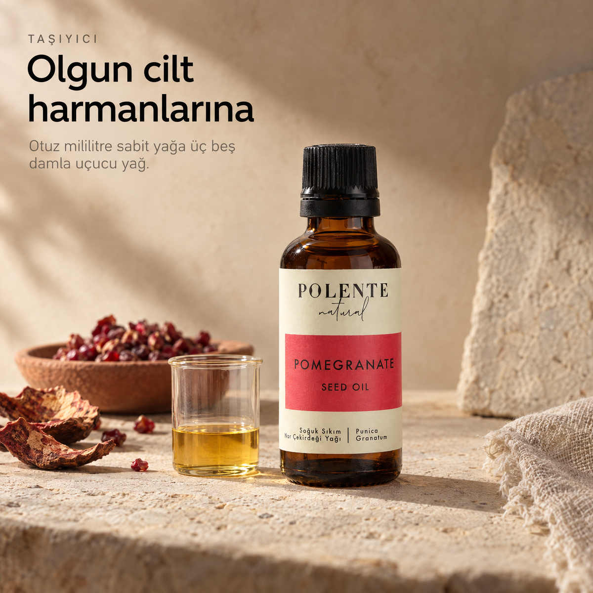 Nar Çekirdeği Yağı 30 ml — taşıyıcı yağ, cam beher içinde berrak altın rengi yağ