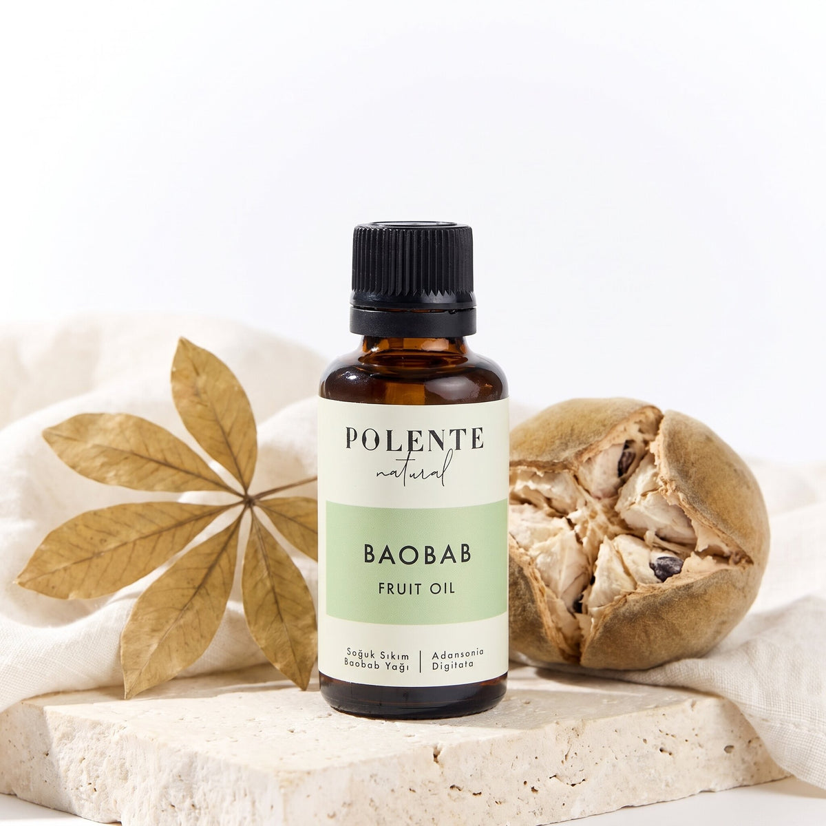 Baobab Yağı Soğuk Sıkım 30 ml — baobab meyvesi ve tohumlarıyla botanik konsept görseli
