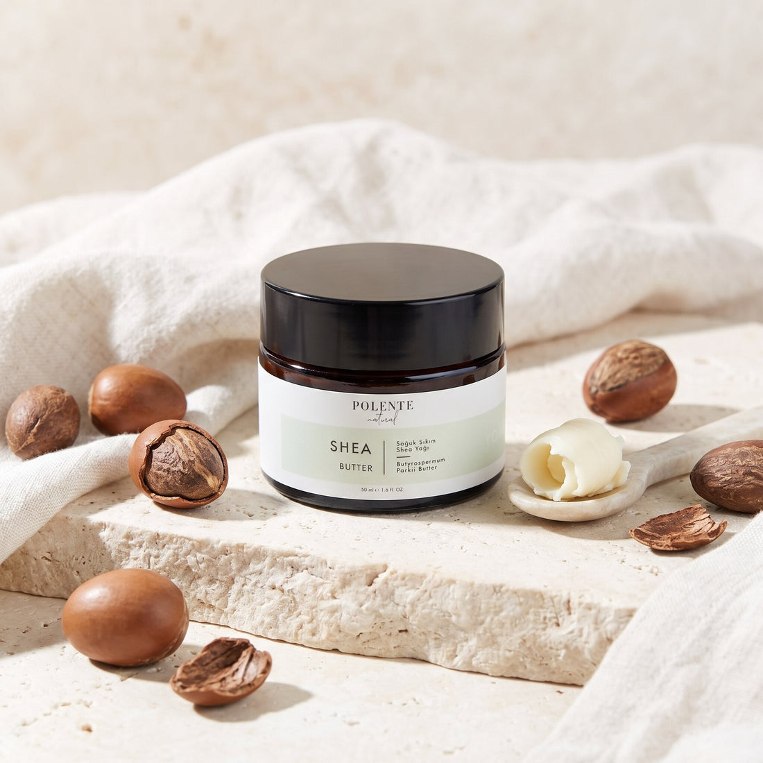 Shea Butter Soğuk Sıkım 50 ml — shea cevizi ve ham yağ dokusuyla botanik konsept görseli