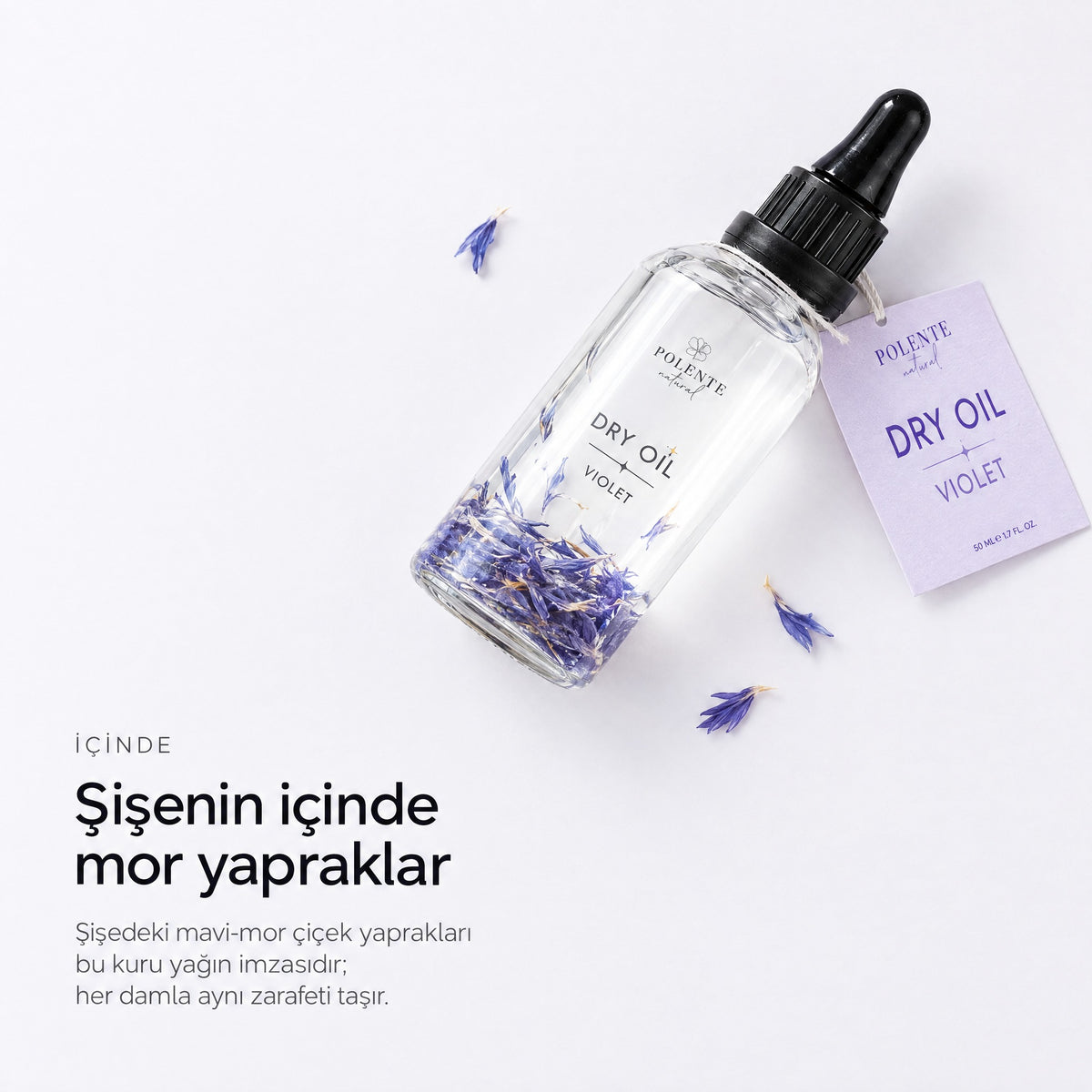 Violet Dry Oil 50 ml çok amaçlı kuru yağ — Şişenin içinde mor yapraklar